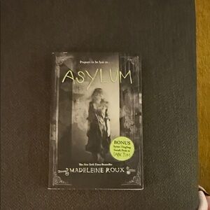 Asylum by Madeleine Roux - Black and Green Paperback Book